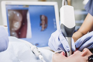 Dentist using digital scanner