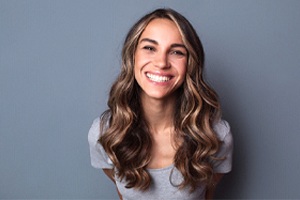 Closeup of woman smiling with straight, white teeth