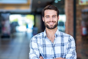 Man with straight, white teeth smiling