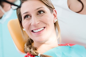 Smiling woman in dental chair