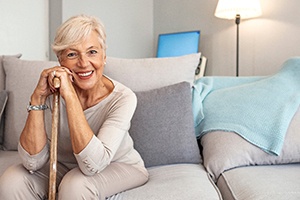 woman smiling with dentures in Michigan City