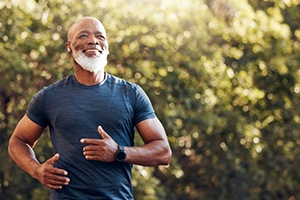 a healthy man going for a jog 