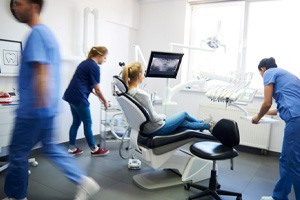 a patient sitting in a dental operatory