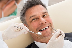 Man smiling at the dentist