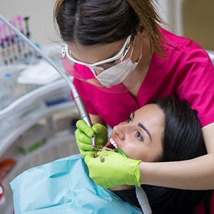 Female patient receiving dental care