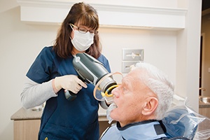 Dental assistnat capturing digital x-rays