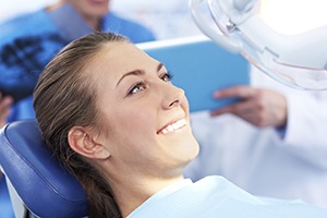 Smiling woman in dental chair