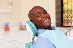 Smiling man in dental chair