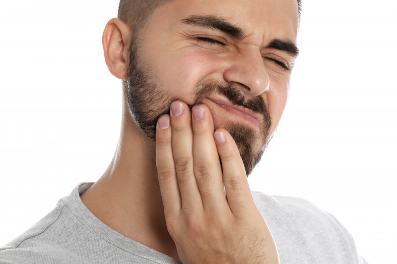 Man with toothache who wishes to prevent dental emergencies