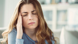 a patient suffering from a headache